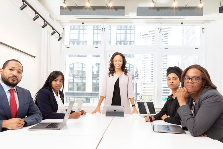 Group of coworkers on a board room